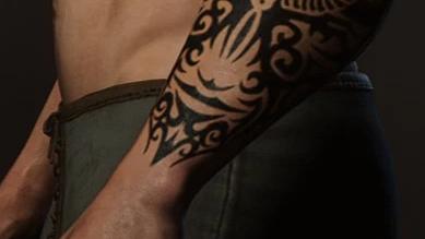 Desmond Miles Forearm Tattoo